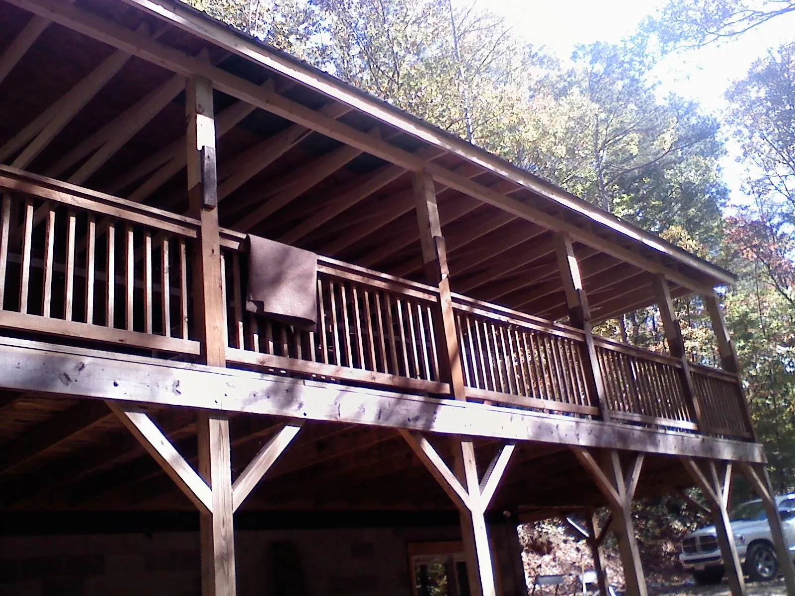 Timber framing under a new elevated porch and deck — Roof Leak Repair in Entriken by Roofing Brothers